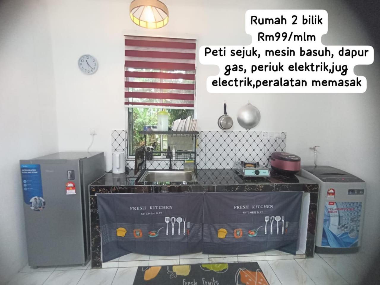 Haji Ineng Homestay- *